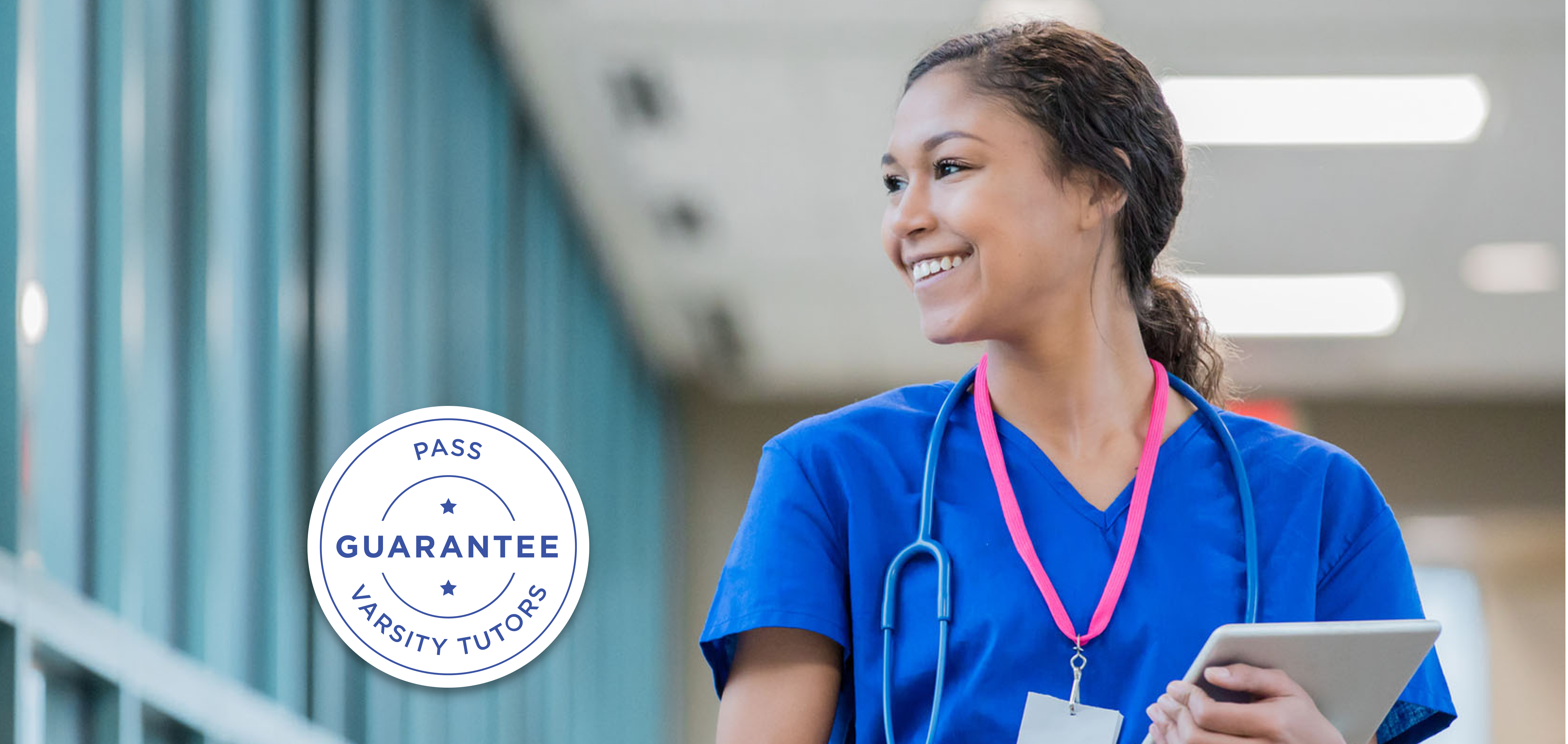 Nurse walking down hallway smiling