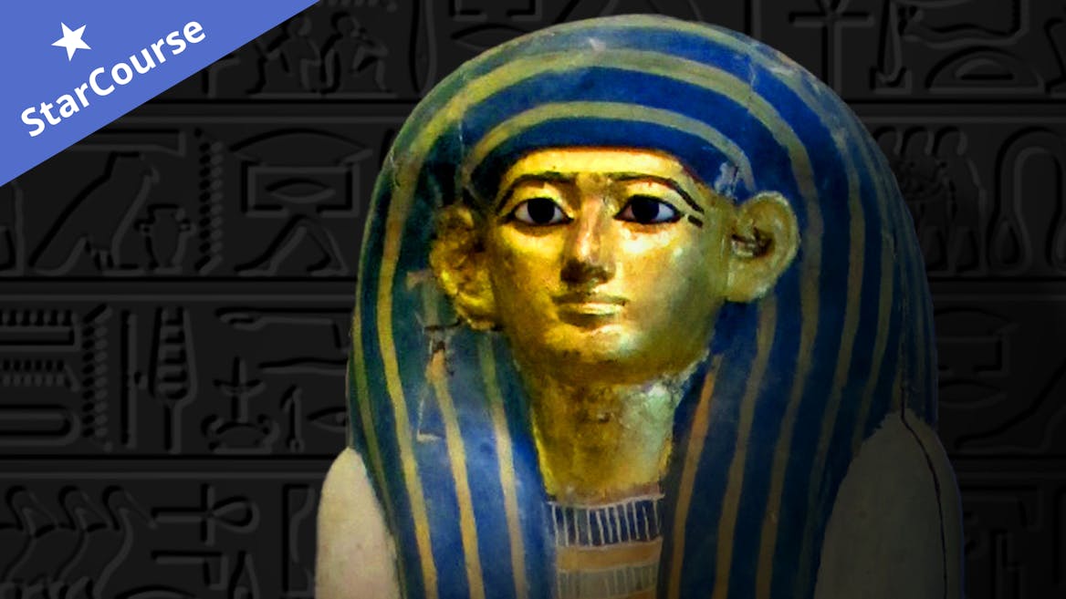 A sarcophagus in front of a wall with hieroglyphics A sarcophagus in front of a wall with hieroglyphics