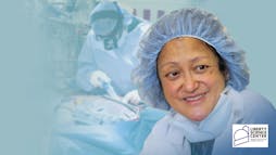 a surgeon smiling a surgeon smiling