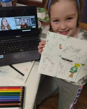 Girl holding art during StarCourse
