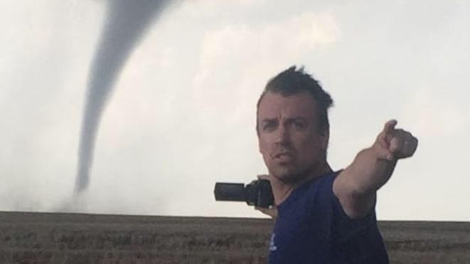 Reed taking a video of a tornado