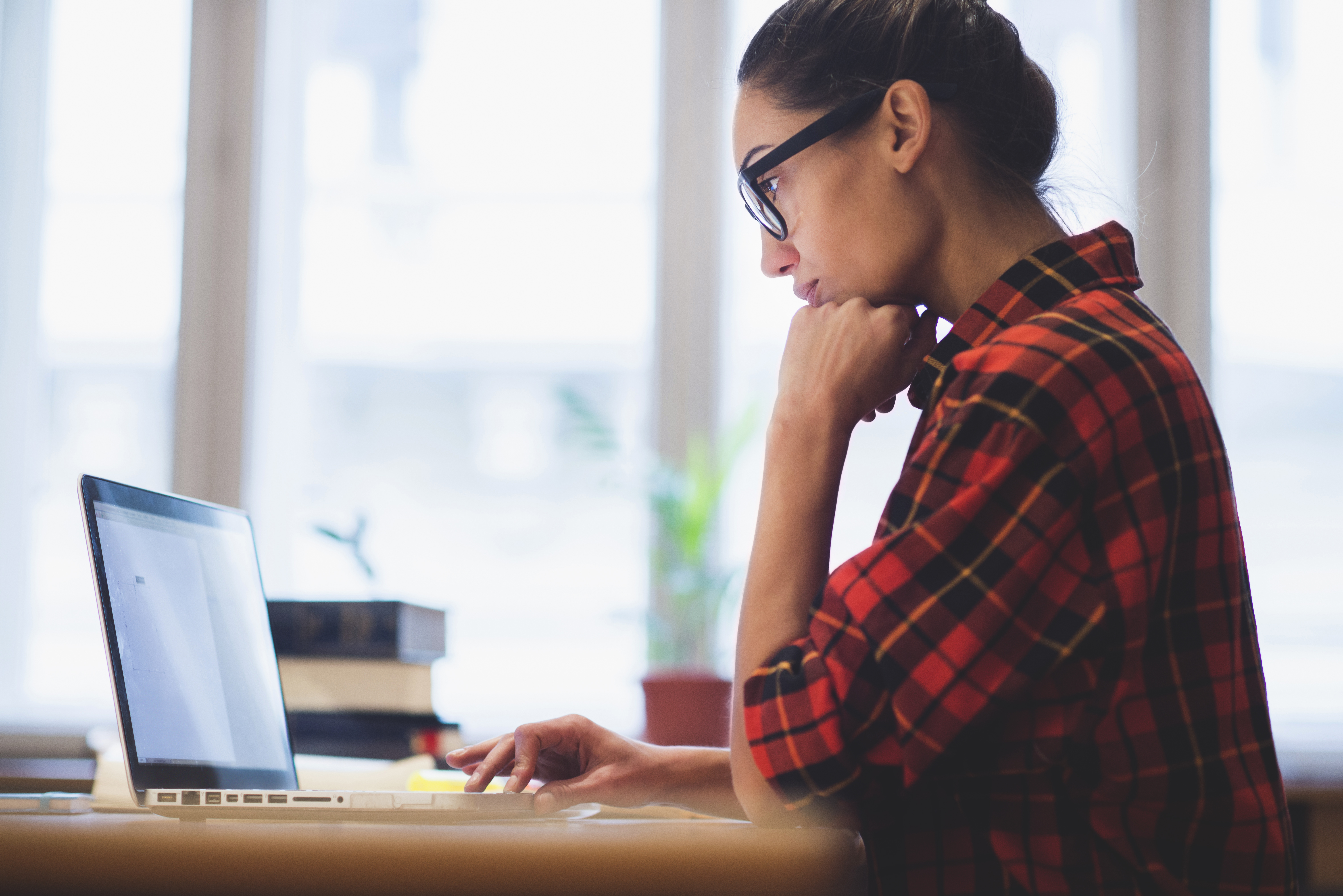 a woman using a laptop
