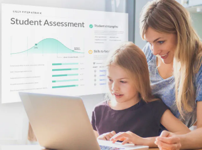 Parent and child looking at a laptop Parent and child looking at a laptop